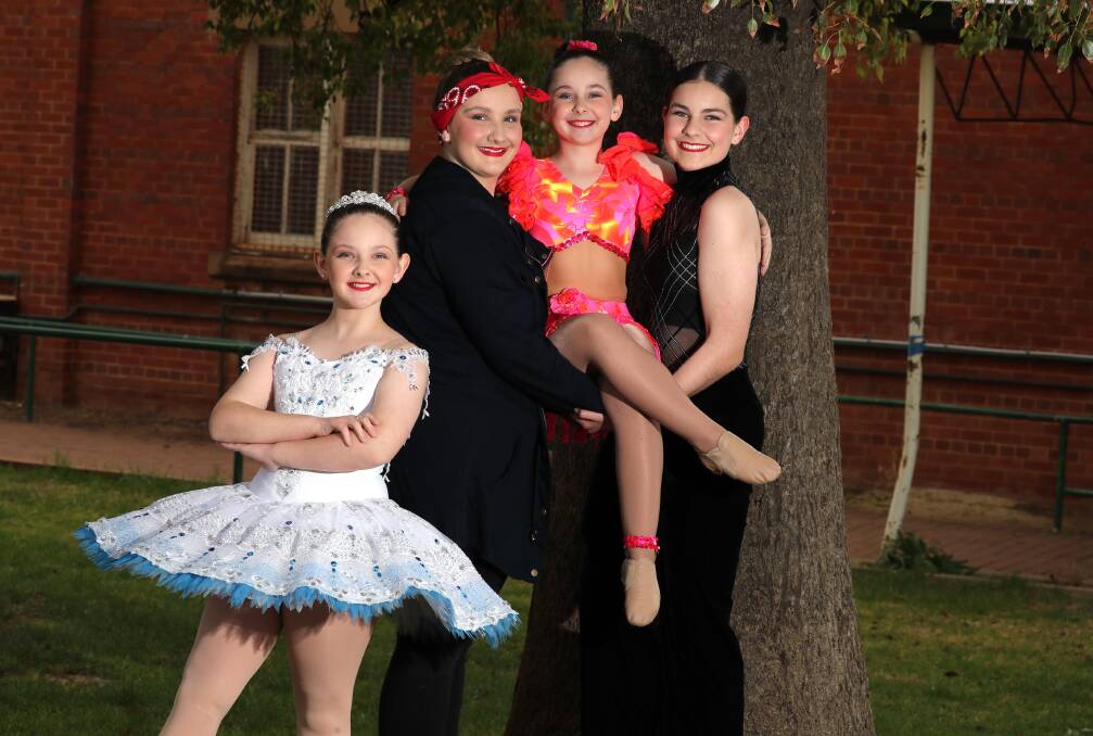 STRIKE A POSE: The Rumbachs sisters, Maisie, 11, Abbey, 17, Tilly, 8 and Hannah, 14, prepare for the City of Wagga Eisteddfod. Picture: Les Smith 
