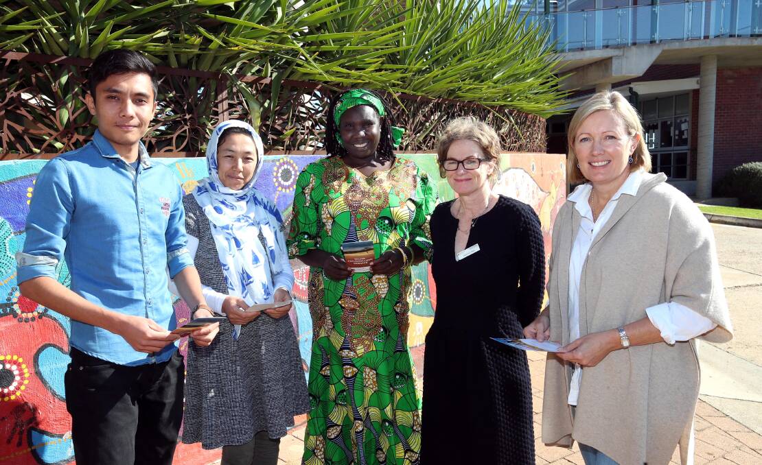 DISCUSSING THE ISSUES: Shokrollah Abbasi, Hakimeh Rahimi, Constance Okot, Deborah Warr and Christine Howard. Picture: Les Smith 