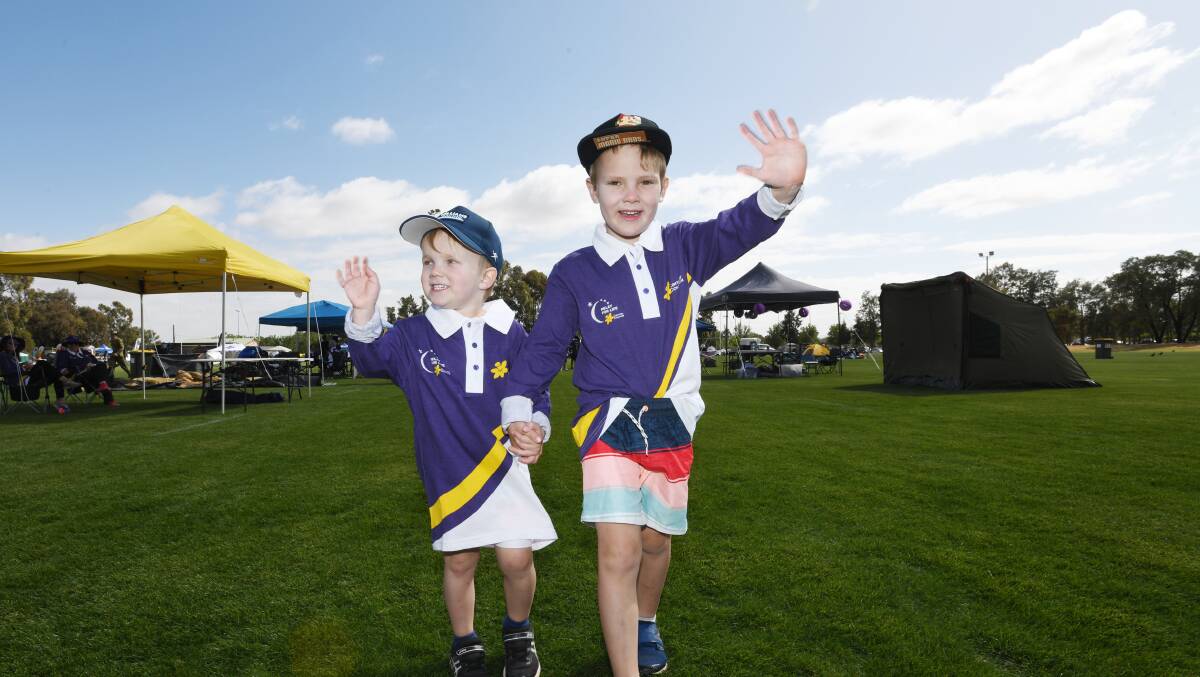 NEVER TOO YOUNG: Archie Penny, 4, and Oscar Penny, 5, proving age is just a number when it comes to showing support. 