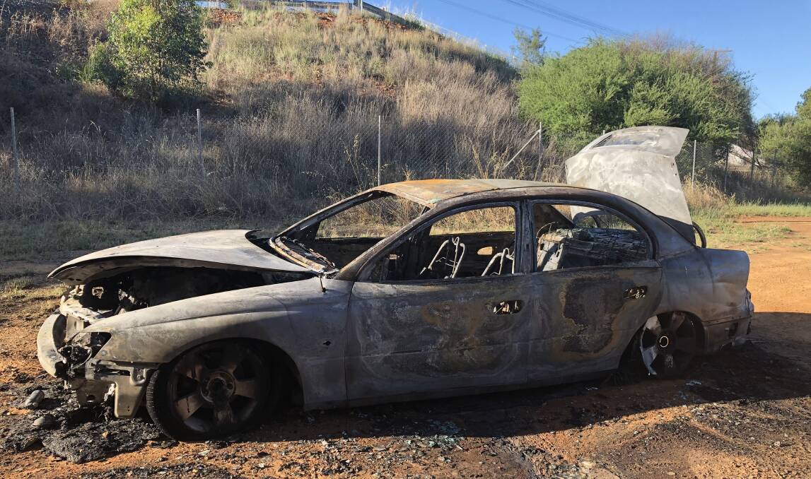 VEHICLE ALIGHT: In January this year, a driver of a passing train spotted this car on fire near the Red Hill Road rail overpass. 