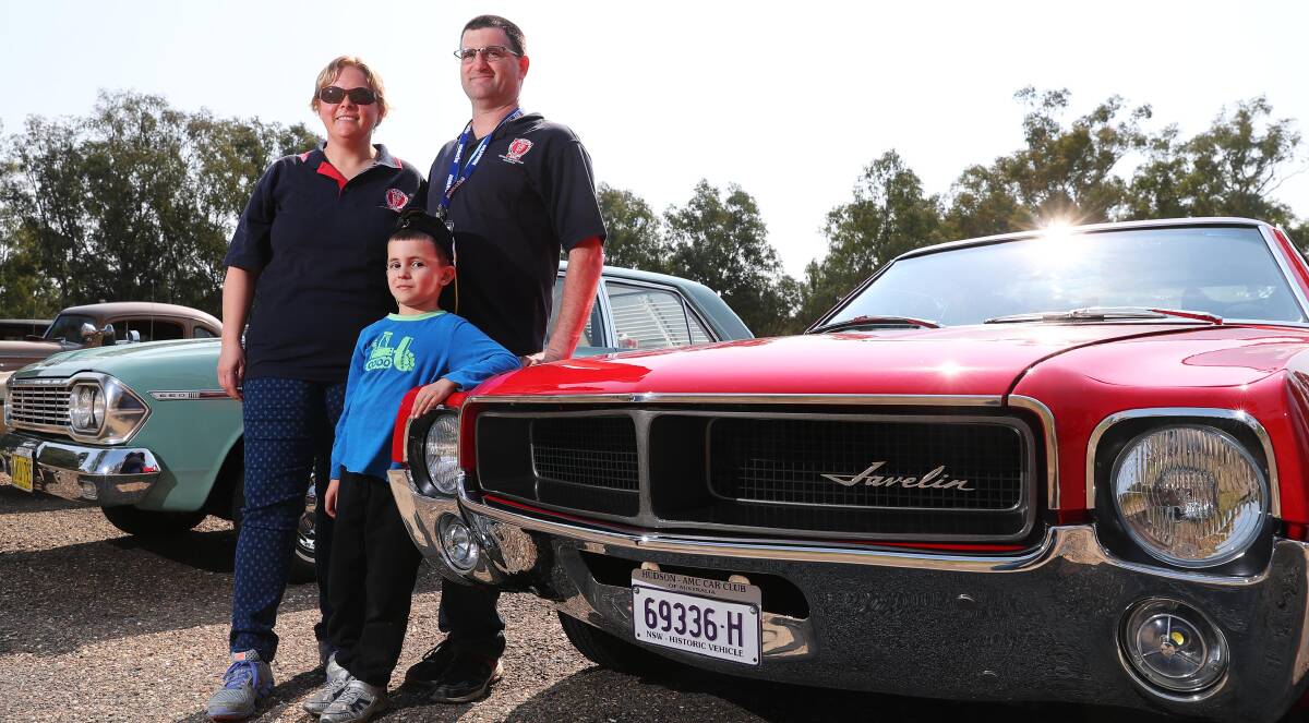 FAMILY TRADITION: Karen, Thomas, 6, and Jeffery Fripp made the trip to Wagga from Quakers Hill with their restored Hudson 1968 Rambler Javlin. Picture: Emma Hillier 