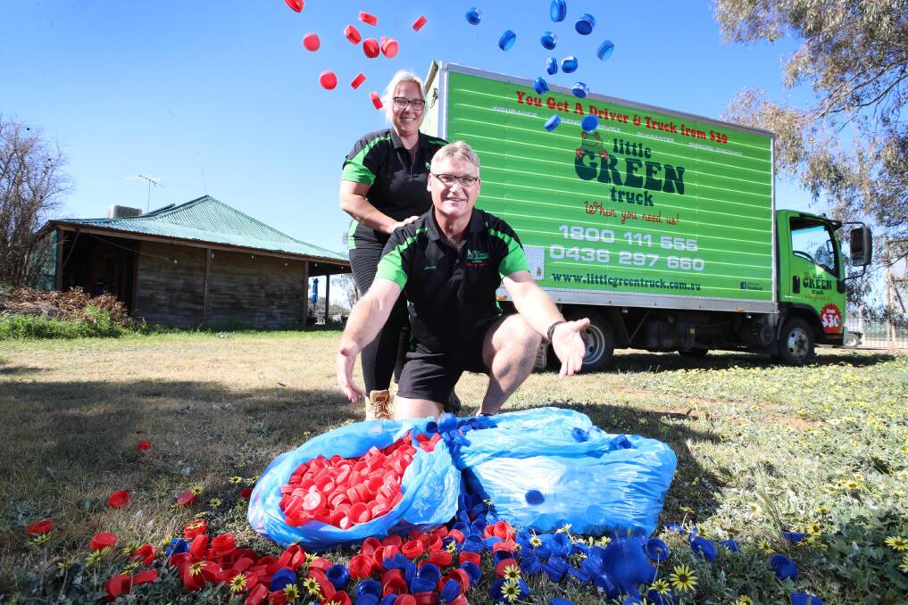 LENDING A HAND: Leanne and Jason Sainsbury are volunteering their time to drive thousands of lids to Canberra. Picture: Les Smith 
