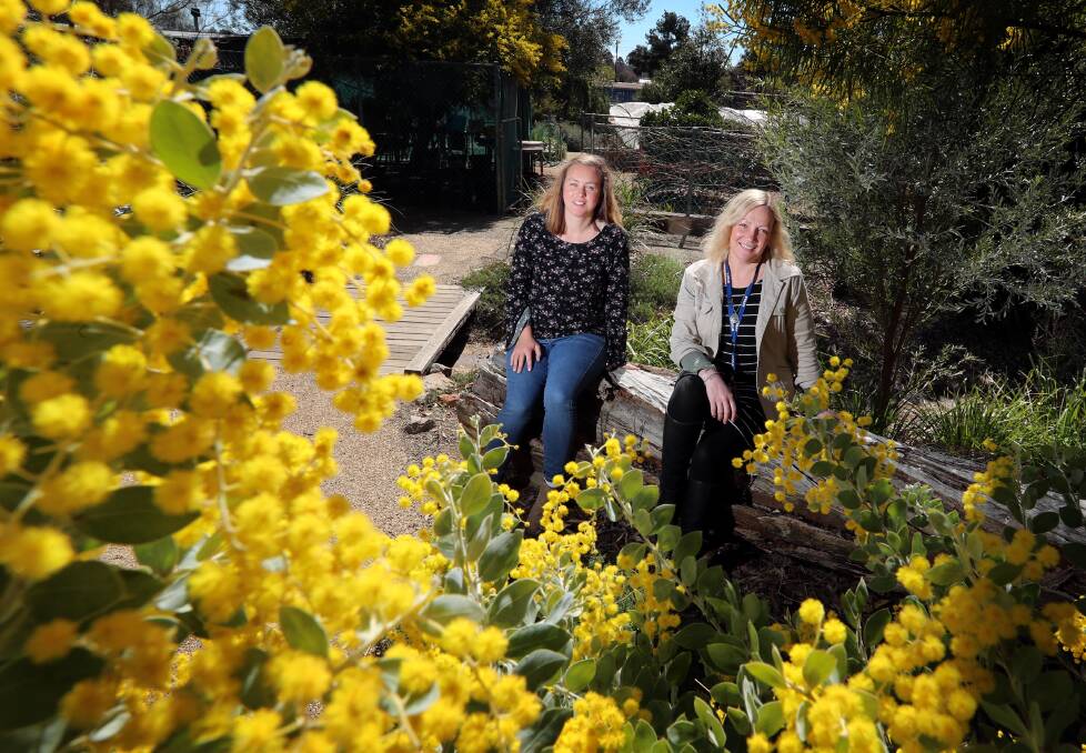 IN BLOOM: Tina de Jong and Kaz Leary said Erin Earth's gardens are looking beautiful as spring begins. Picture: Les Smith 