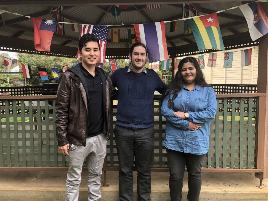 GROUP EFFORT: Abbas Ali, Bryce Allen and Dalal Alhasan are working together to help the refugees in the community. Picture: Annie Lewis 