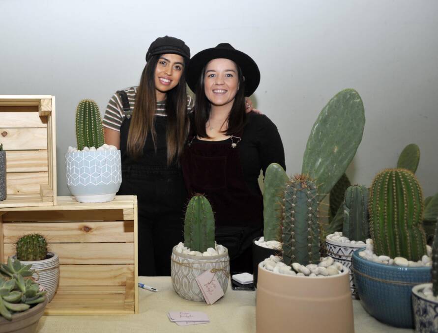 CACTUS DESIGNS: Jo Harmer and Erin Galloway from Luna and Jungle at the fourth birthday of the River and Wren Market. Picture: Chelsea Sutton  