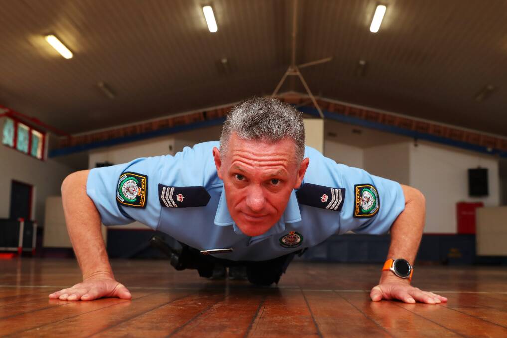 DROP AND DO FIVE: Sergeant Nathan Maxwell says some people do not realise just how fit they need to be to pass the testing. Picture: Emma Hillier 