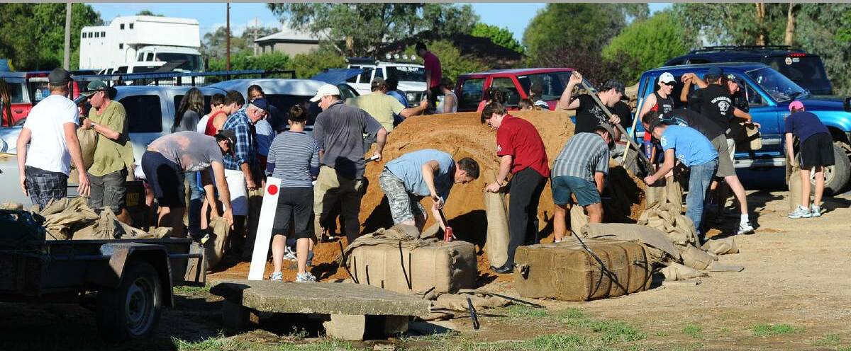 FLASHBACK TO FLOODS: In 2012, residents were filling sandbags as they prepared to evacuate North Wagga. Picture: Addison Hamilton