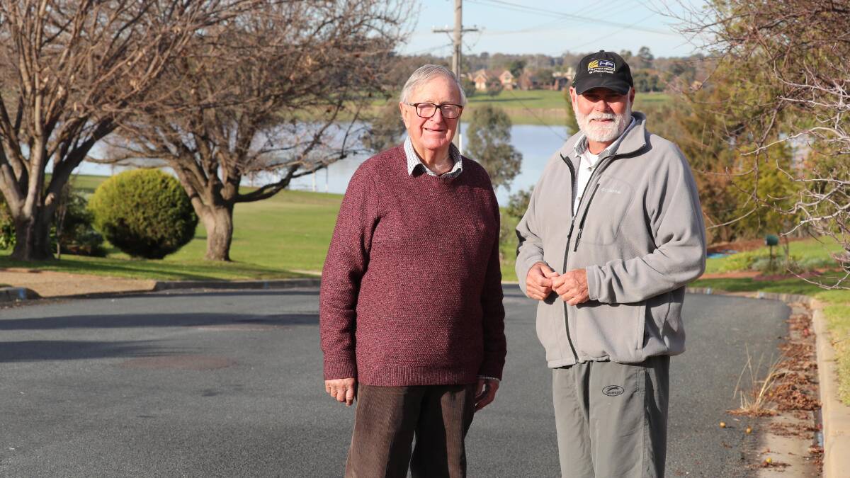 GREAT NEIGHBOURS: Digby Foster and Allen Moller are just two of the home-owners on the 'Street of the Season'. Picture: Les Smith 