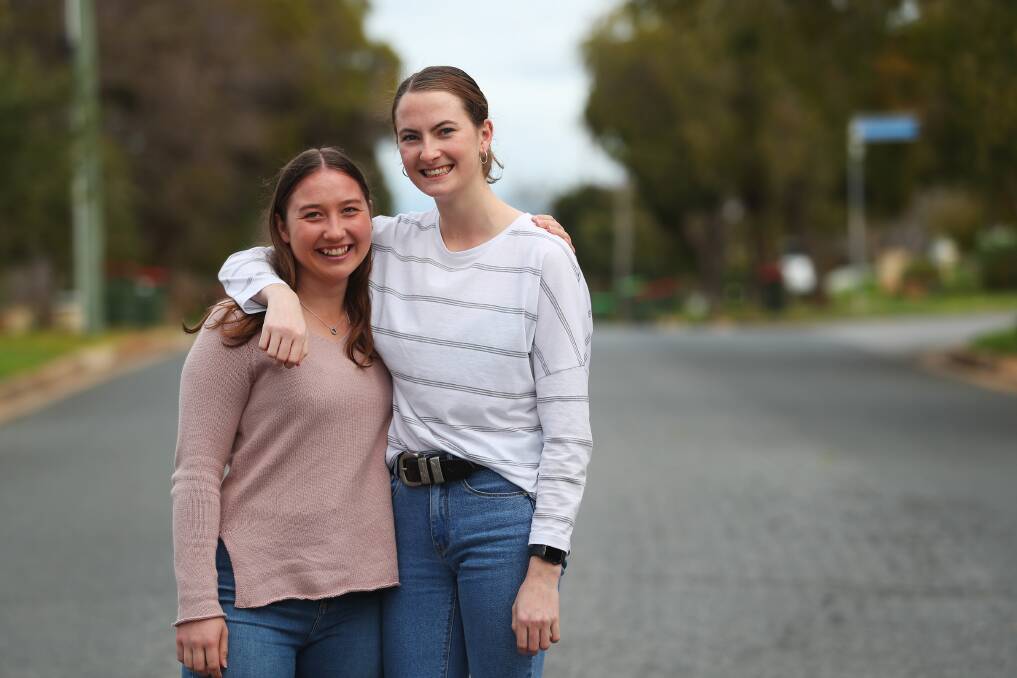 MORE LIKE COUSINS: Lucy Anderson and Amelia O'Connell have remained close over the years. Picture: Emma Hillier 