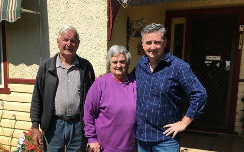 COLLECTING STORIES: Ladysmith Hall Committee members Stan and Marie Wilson with Damian Callinan. Picture: Supplied 