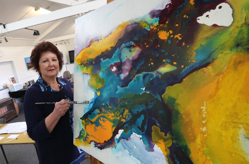 CREATIVE SIDE: Lesley Looney works on her latest piece. Picture: Les Smith 