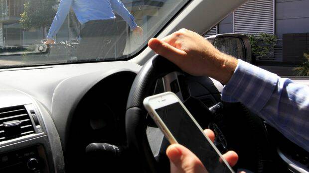 TARGETING MOBILE USERS: New laws will allow cameras to identify drivers who commit mobile phone offences. File Shot 