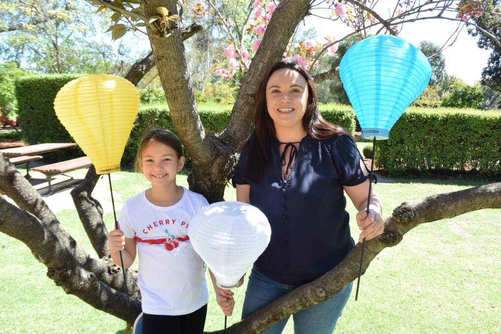 LIGHTING THE LANTERNS: Rachelle Mintern and her daughter Taylor Garrett, 8, hope to see Wagga support the event. Picture: Annie Lewis 