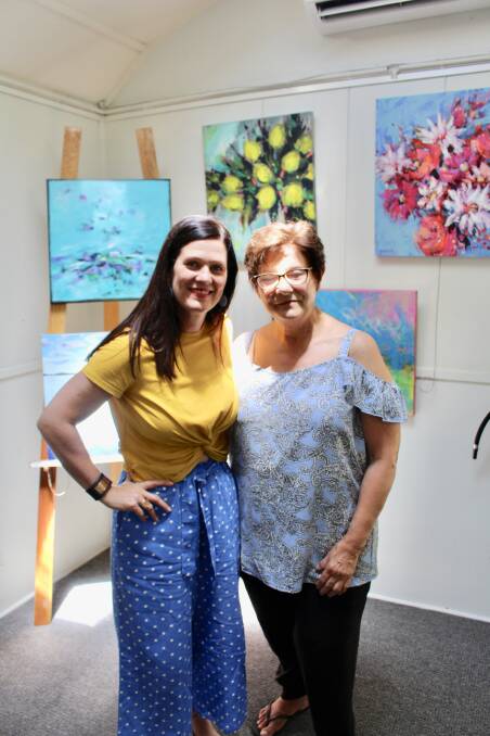 A NEW EXHIBITION: Kylie van Tol and Julie Savill have been working hard to set the studio up for the showcase ‘Spectrum’. Picture: Annie Lewis   