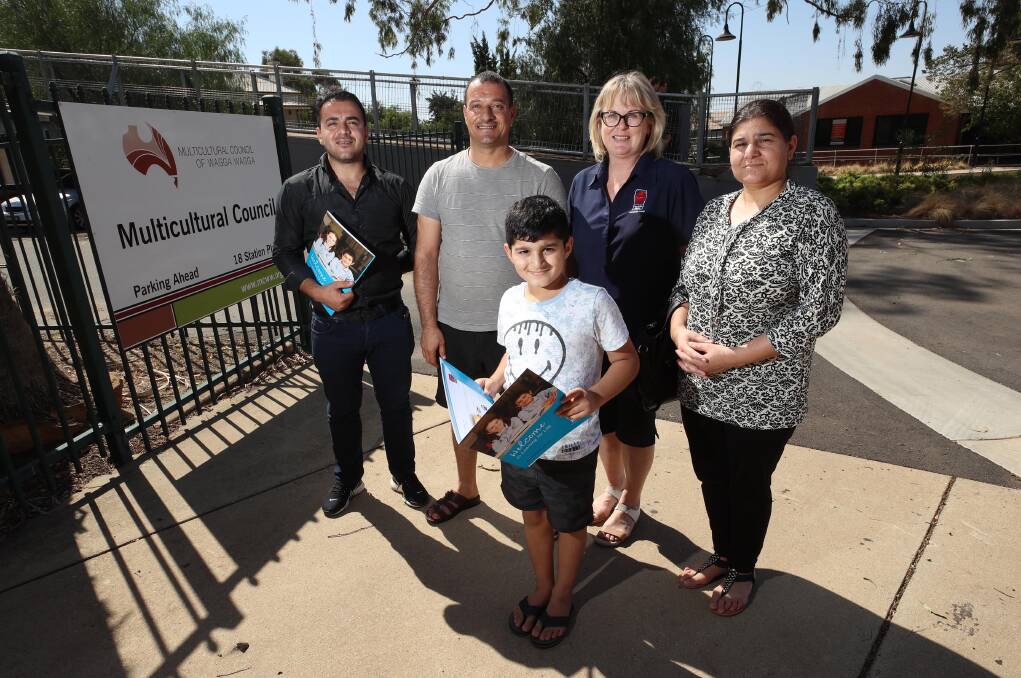 READY TO LEARN: Rashed Shani Baqi with Hagy Khalaf, Fiona Carroll, Kozy Khalaf and Malek Khalaf, 8. The Khalafs are the latest family to sign up to the Learning for Life Program. Picture: Les Smith 
