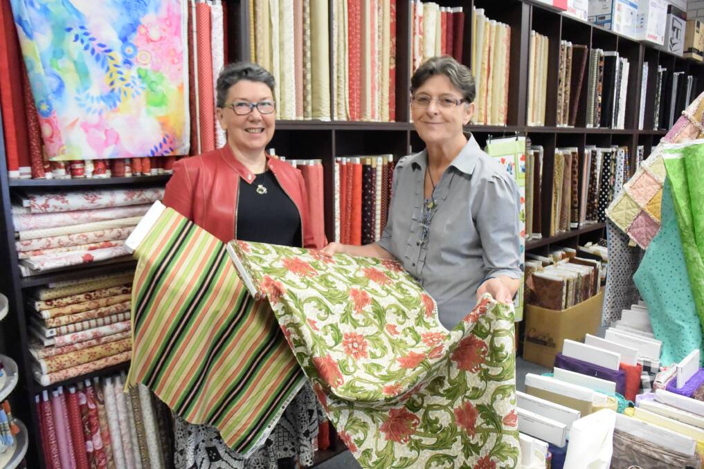 STARTING FROM SCRATCH: Anita McAdam and Faye Verral show off the beautiful fabrics that can be used to create garments. Picture: Annie Lewis 