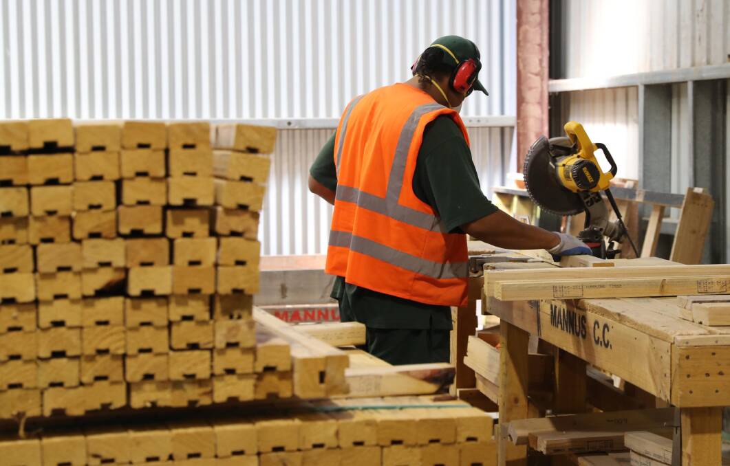PUT TO WORK: One of the biggest industries in Mannus is processing timber. In a year, the prison produces 50,000 cubic metres. Picture: Les Smith 