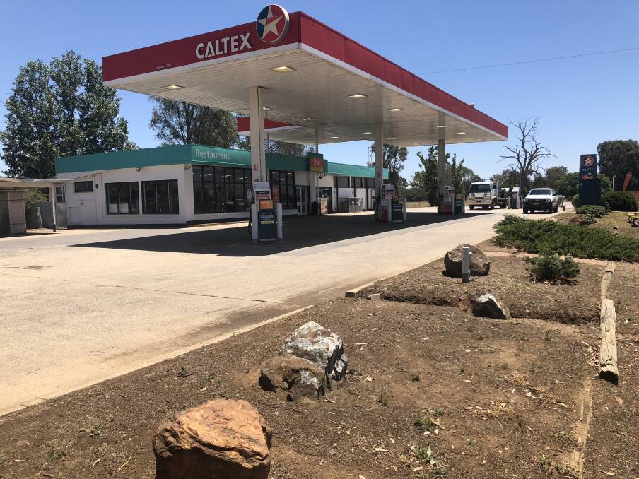 About 4am on Wednesday, two men forced their way into the Gumly service station on the Sturt Highway.