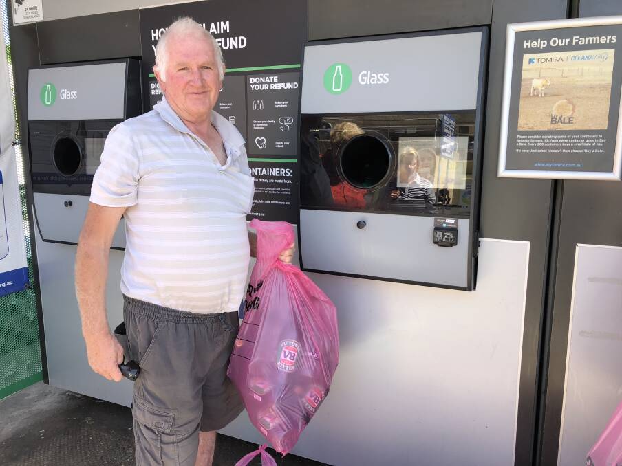 HELPING A MATE: Steve Manderson stopped by the Gurwood Street Return and Earn kiosk to recycle bottles for a friend. Picture: Annie Lewis 
