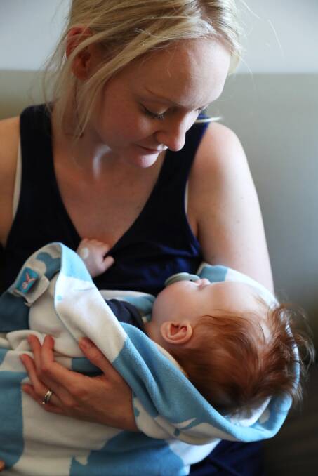 A MOTHER'S LOVE: Alyssa and Parker Johnston, three-and-a-half months, spend the leadup to Christmas Day in hospital. Picture: Emma Hillier 