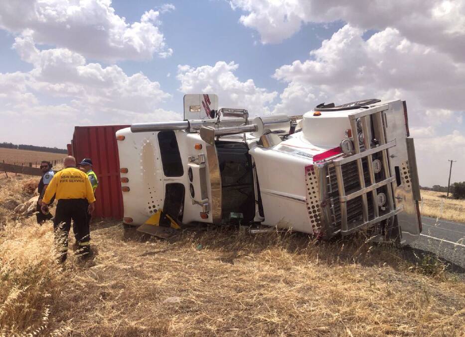 Emergency services on the scene of a truck rollover at Goldfields Way, Temora. 