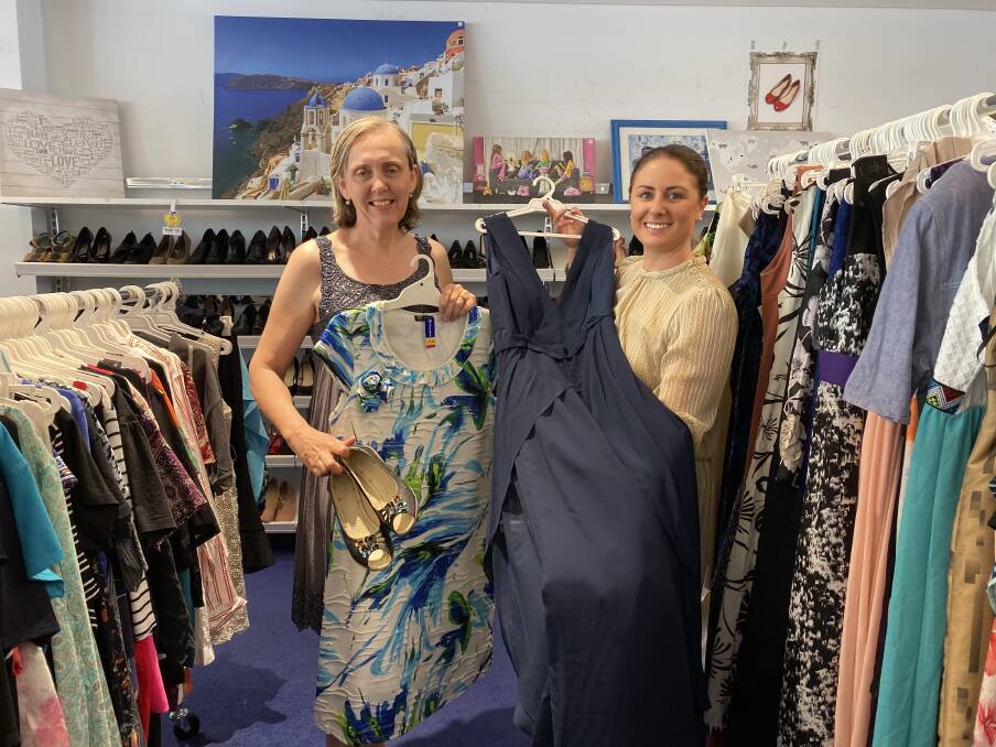 SECONDHAND TREASURES: Cindy James and Jacqui Malcolm are wearing outfits from Vinnies and encourage people to hunt for bargains. 