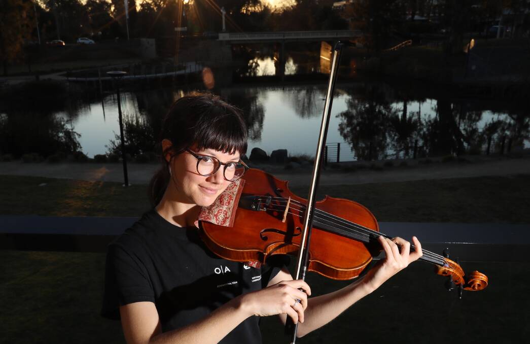 Katie Yap plays the viola in the orchestra conducted by Warwick Stengards. Picture: Les Smith 
