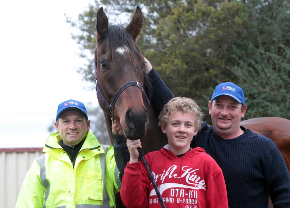 Norm Loy with oldest son, Brodie, and Albury trainer Martin Stein in 2011.