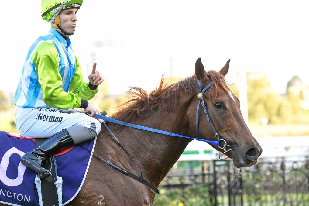 NUMBER ONE: Jockey Lewis German returns to scale aboard Front Page. Picture: RACING PHOTOS