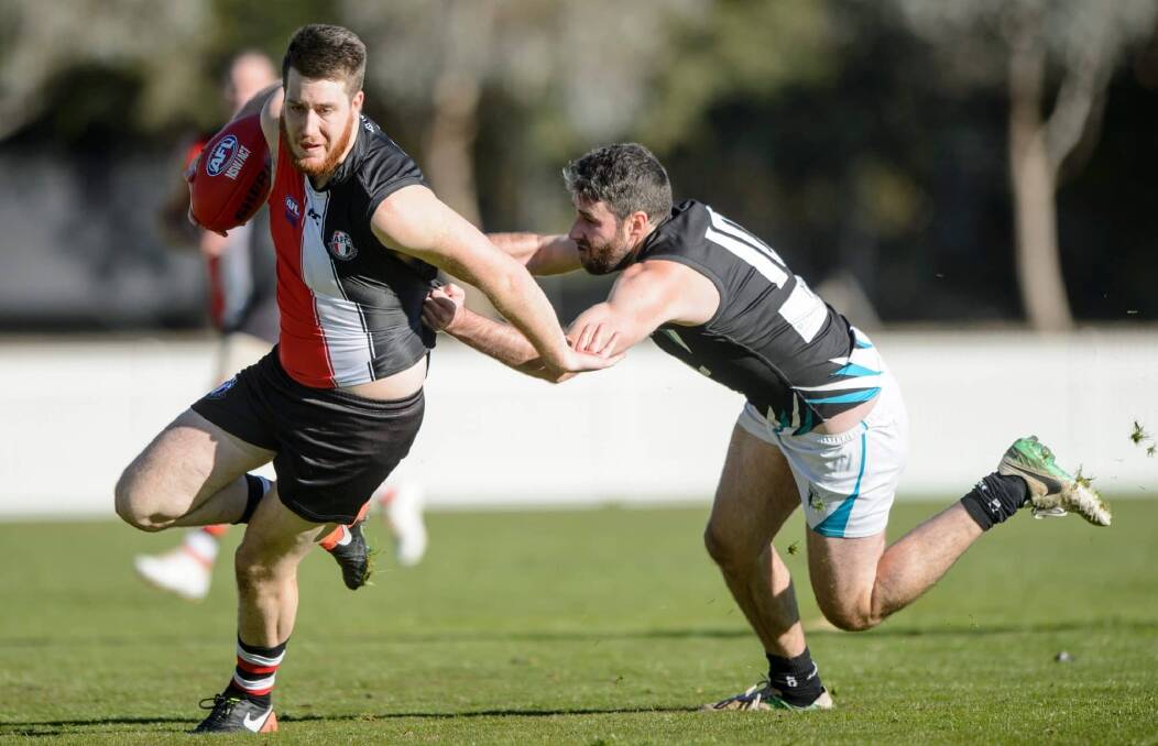 KEY SIGNING: Hayden Armstrong (left) in action for Ainslie. Picture: Canberra Times