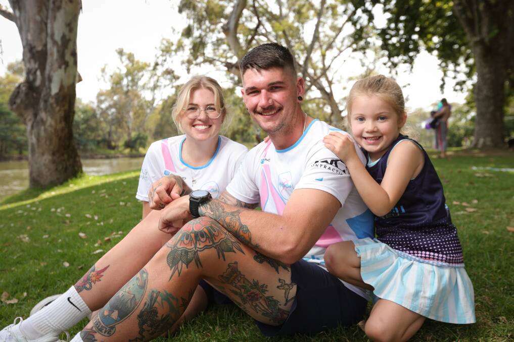 Daniel Boswell, with wife Tenae and daughter Eden, 4, is preparing to run 100 kilometres from Albury to Wagga in one day to raise funds and awareness for his niece after she was recently diagnosed with a rare form of cancer. Picture by James Wiltshire