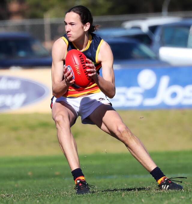 OPPORTUNITIES AWAITING: Leeton-Whitton product Cooper Sharman, pictured playing for the Crows last season, is catching the eye of AFL recruiters.