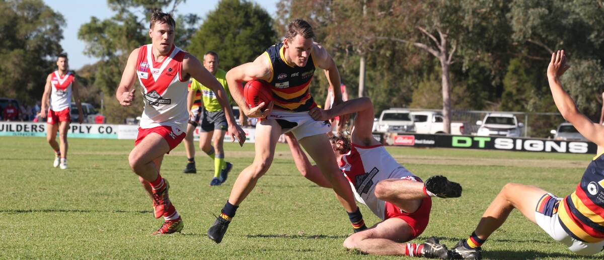 TRAINING RESUMES: Leeton-Whitton's Tim Sidebottom in action last year. The Crows returned to restricted training for the first time last week. 