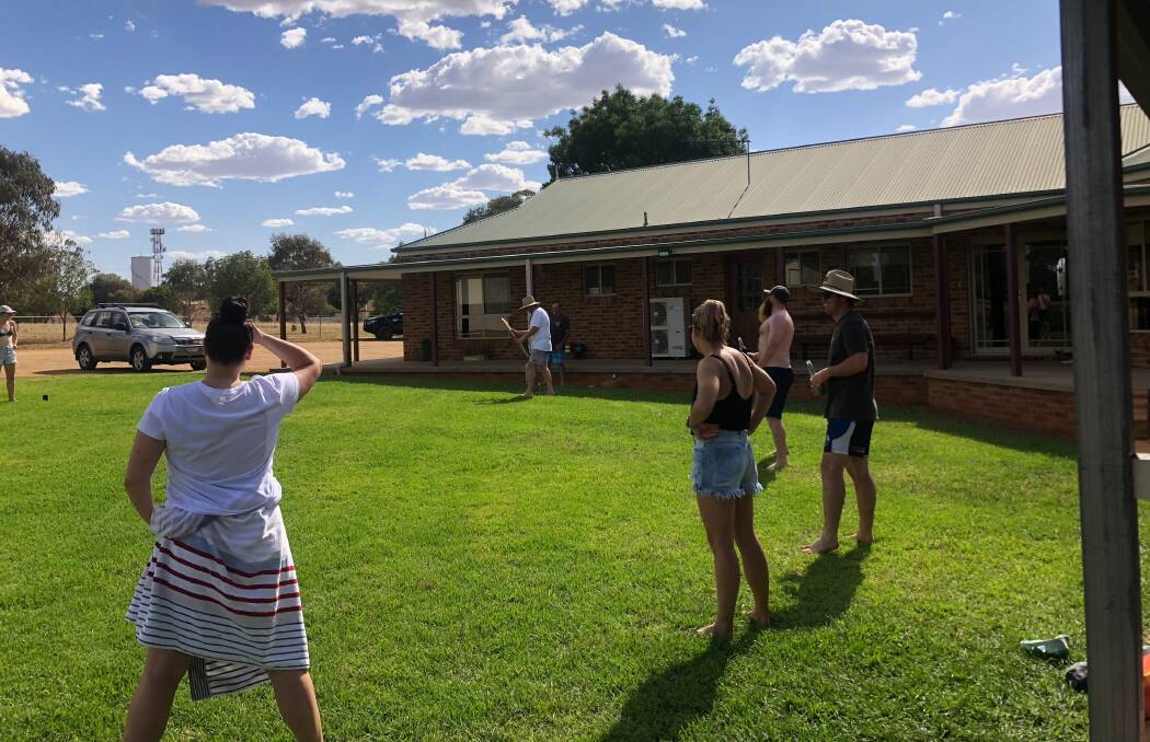FRIENDLY FUN: Backyard cricket in action at the Pattison family Christmas. 
