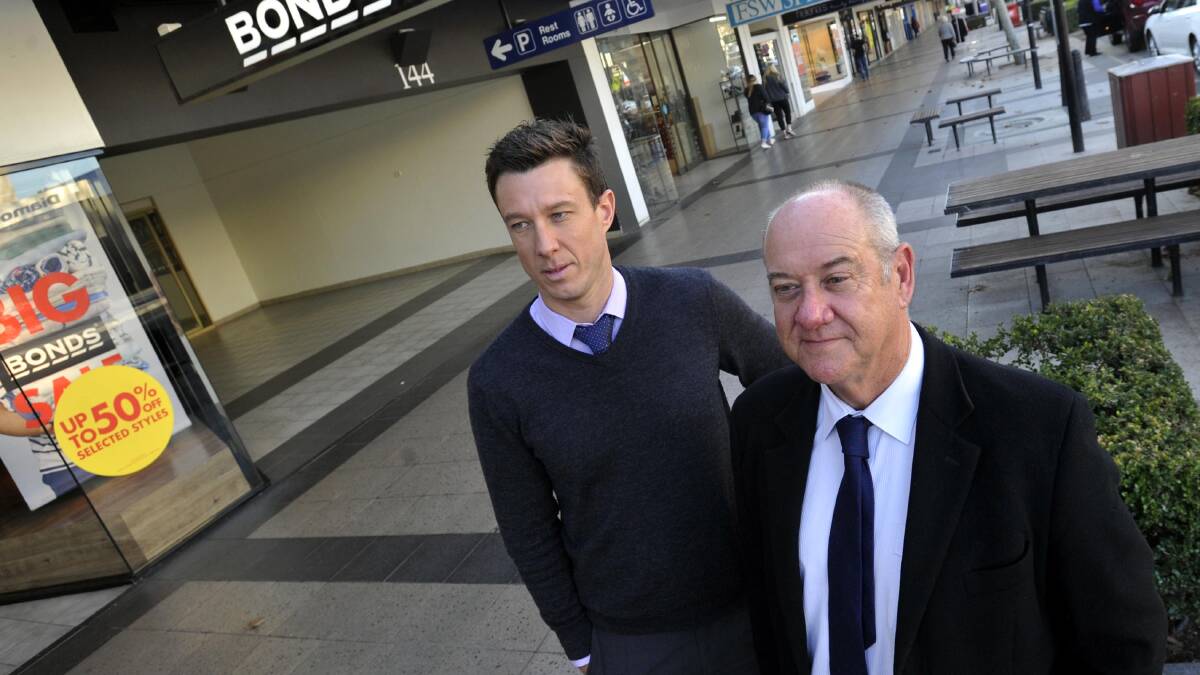 'EVERYTHING IS FINE': Fitzpatricks real estate commercial consultant Greg Howick (front, right) and commercial director Shaun Lowry. Picture: Les Smith