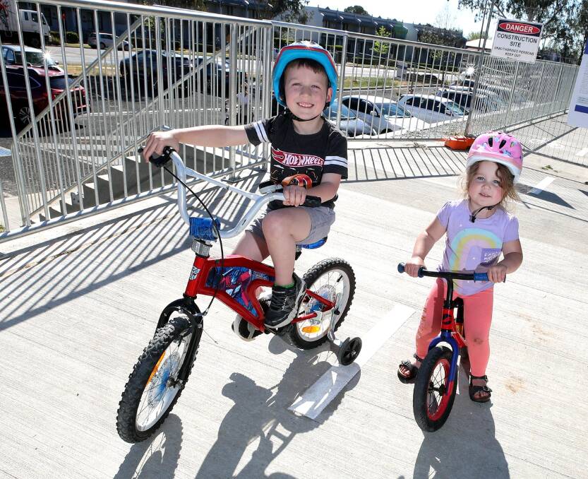 GET READY TO PEDAL: Wagga's Austin Wallace and his sister Rose are eager to test out the new cycling link by the river, which officially opens to the public today. Picture: Les Smith