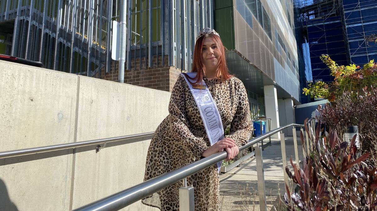 CARRYING ON: Miss Wagga Quest's Community Princess Brittney Hackett about to handover a cheque to the Wagga Base Hospital. Picture: Daina Oliver