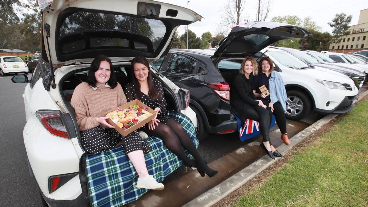 PARKED UP: Emma Corbett, Kim Parker, Pollyanna Groth and Stacey Post eager for a drive-in movie night. Picture: Les Smith