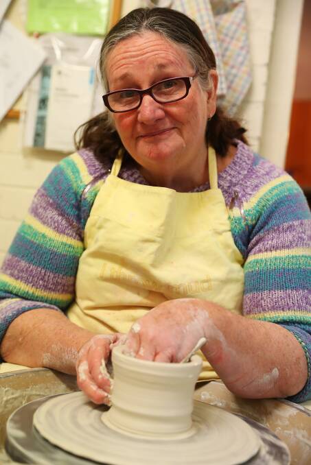 THROW SOME CLAY: Wagga Potters Club member Linda Lander demonstrating the art of pottery. Picture: Emma Hillier