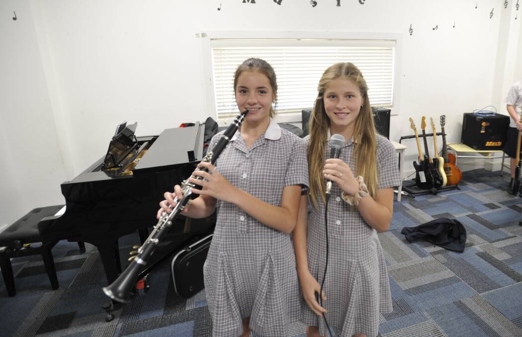 PRACTICE MAKES PERFECT: Wagga Christian College year eight students Olivia Tidd and Bianca Staines rehearsing for the big day. Picture: Daina Oliver