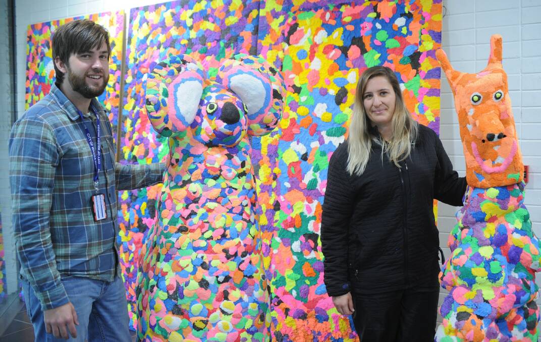 FUN FOAM: Wagga Art Gallery assistant Myle Prangnell and artist Rosie Deacon in the new Fun Foam Fantastical-Fabulous Fun exhibition. Picture: Daina Oliver