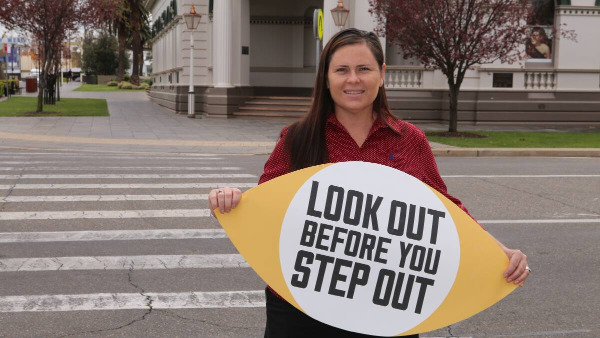 LOOK OUT: Wagga council's road safety officer Emma Reynolds encourages pedestrians to stay alert while crossing roads in the city. Picture: Wagga City Council 