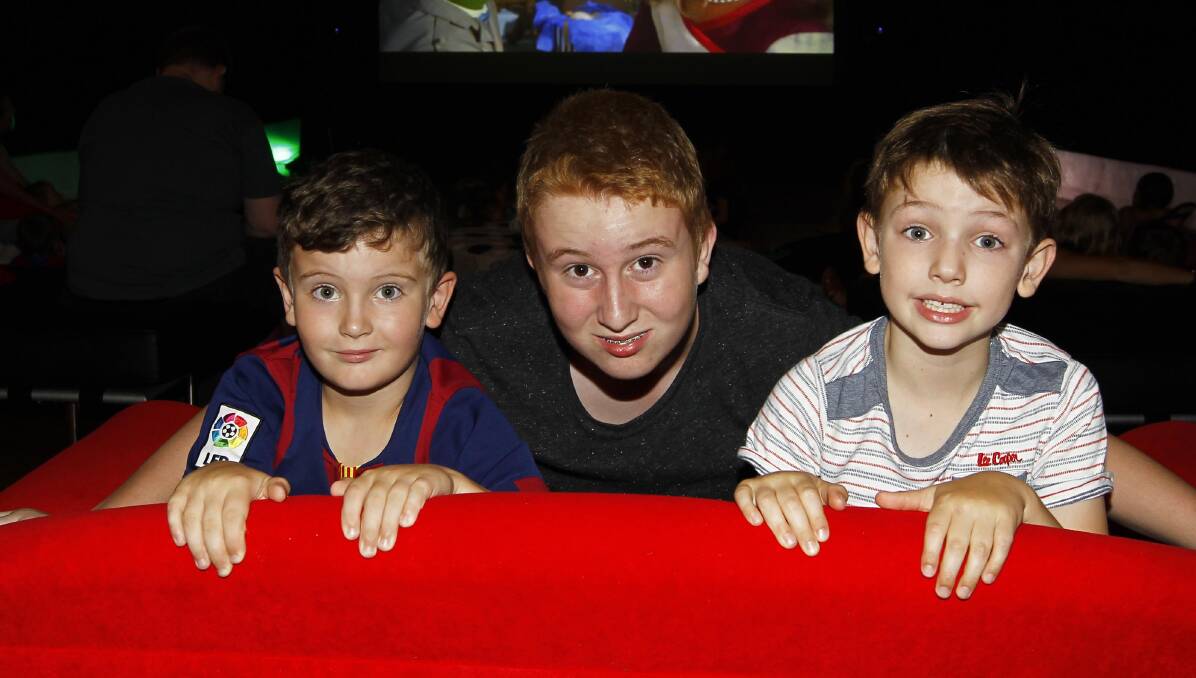 MOVIE TREAT: Fraser Sharpe, Oliver Crawley and Findlay Clarke at the art gallery's pop-up cinema. Picture: Les Smith