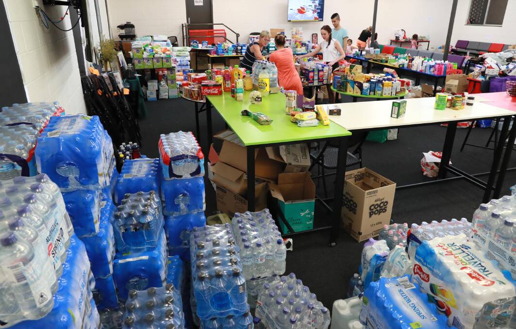 Donations for fire evacuees being received at the Kildare Catholic College Hall. Wagga council says the generosity of the city became a logistical problem that it must solve for future disasters. Picture: Les Smith 