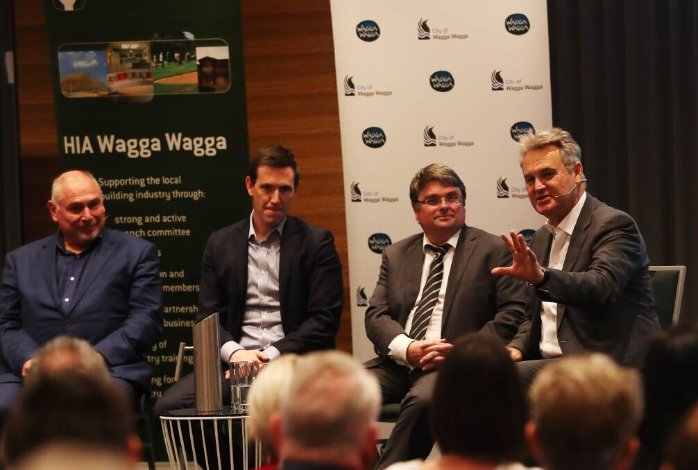 FORWARD THINKING: Panelists Gary White, James Bolton, Peter Thompson and Bernard Salt at the population seminar yesterday. Picture: Emma Hillier 