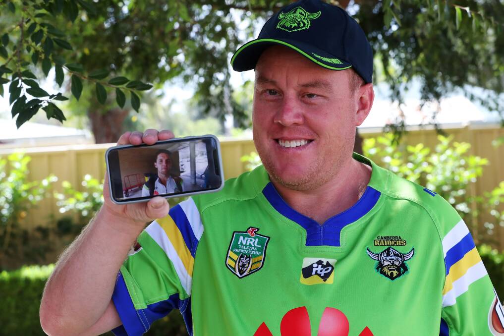 SHOCKED: Wagga's Scott Gerhardy is shocked by the special video message he received from the Canberra Raiders stars after he lost his home and beloved footy possessions to a fire at the weekend. Picture: Emma Hillier
