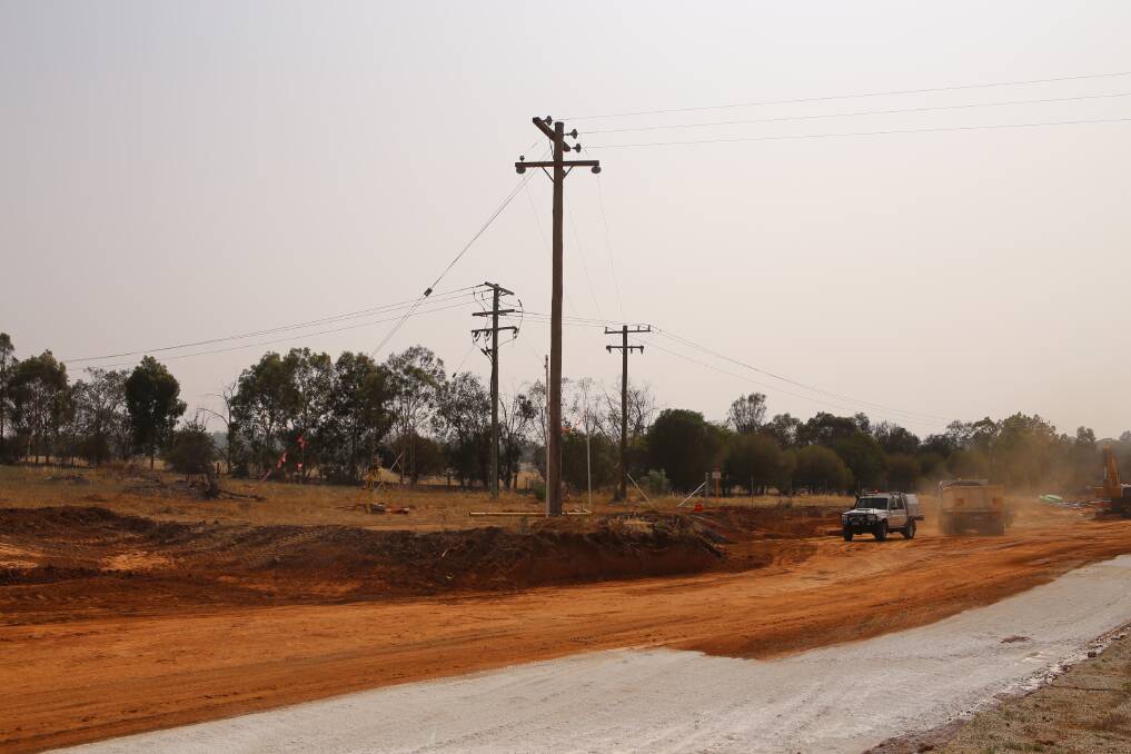 CHARGING AHEAD: A power pole is about to become a temporary feature on the Farrer Road upgrade as council looks to build around the infrastructure until it can remove it later down the track. Picture: Wagga City Council 