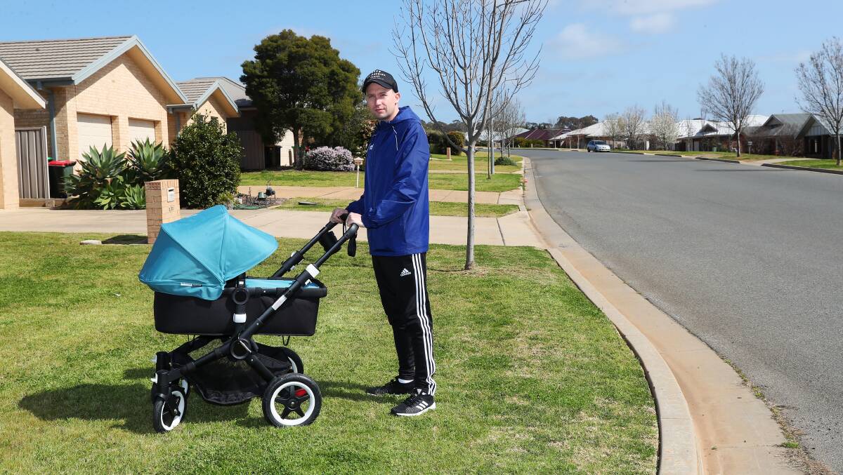 EXPAND: Bourkelands resident Robert Baliva is forced to walk on the side of the road on some suburban streets rather than a footpath. Picture: Emma Hillier 
