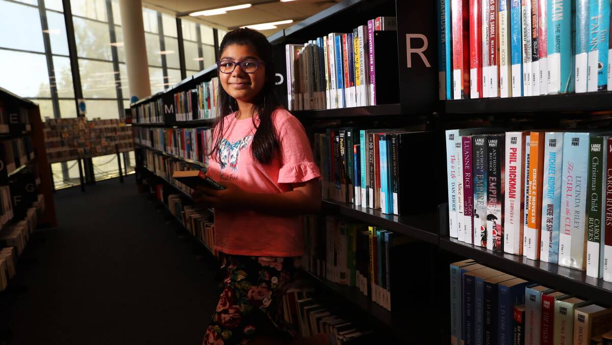 LIBRARY LOVER: Wagga's Ariba Omar regularly visits the city's library with her mum to take advantage of the multitude of services available to the community. Picture: Emma Hillier 