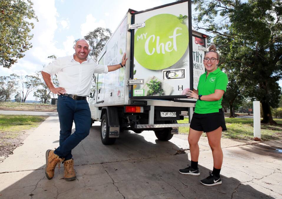 ADAPTING AND THRIVING: Wagga's My Chef Cuisine managing director Frank Coorey and delivery driver Laura Gale loading the truck as popularity for healthy, frozen meals surge. Picture: Les Smith